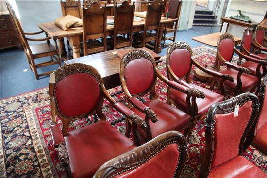 A set of six mid 19th century Anglo Indian carved padouk elbow chairs, W.2ft H.3ft 1in.